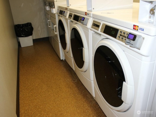 laundry room featuring washing machine and dryer