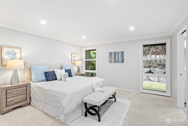 carpeted bedroom featuring crown molding