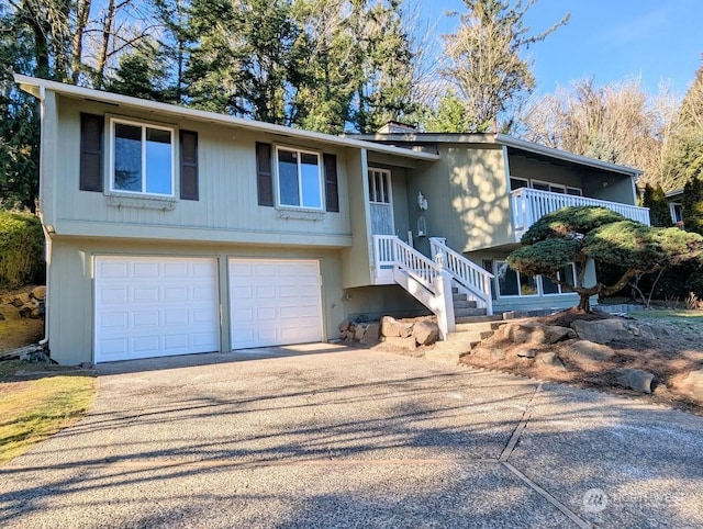 raised ranch featuring a garage