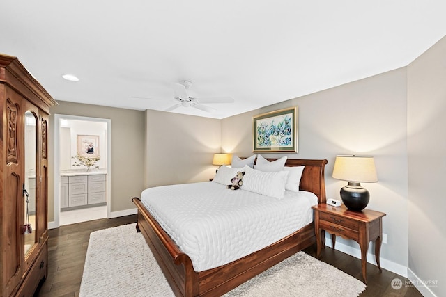 bedroom with dark hardwood / wood-style floors, ceiling fan, and ensuite bathroom