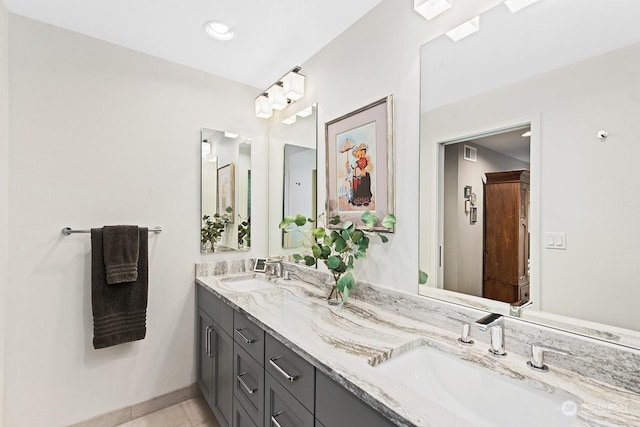 bathroom featuring vanity and tile patterned floors