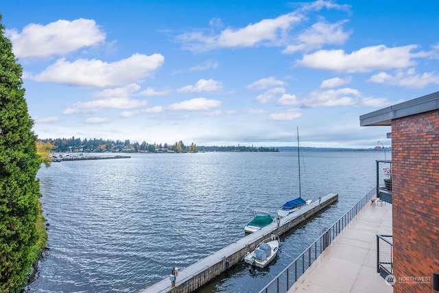 view of dock with a water view