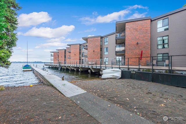 dock area with a water view