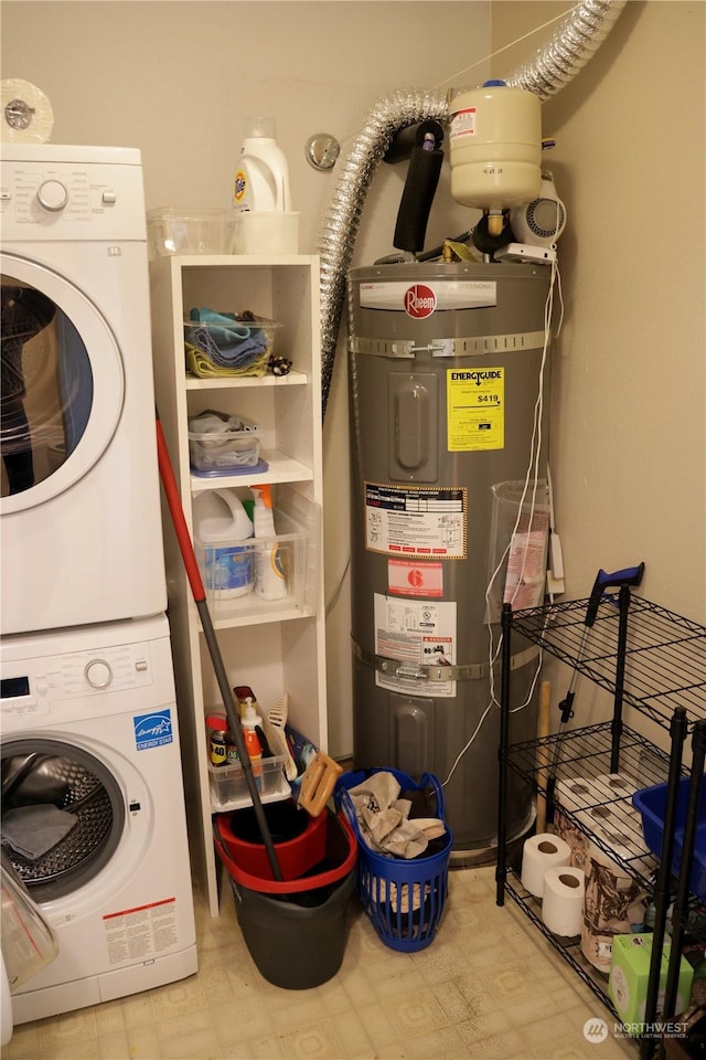 laundry area with secured water heater and stacked washer and dryer