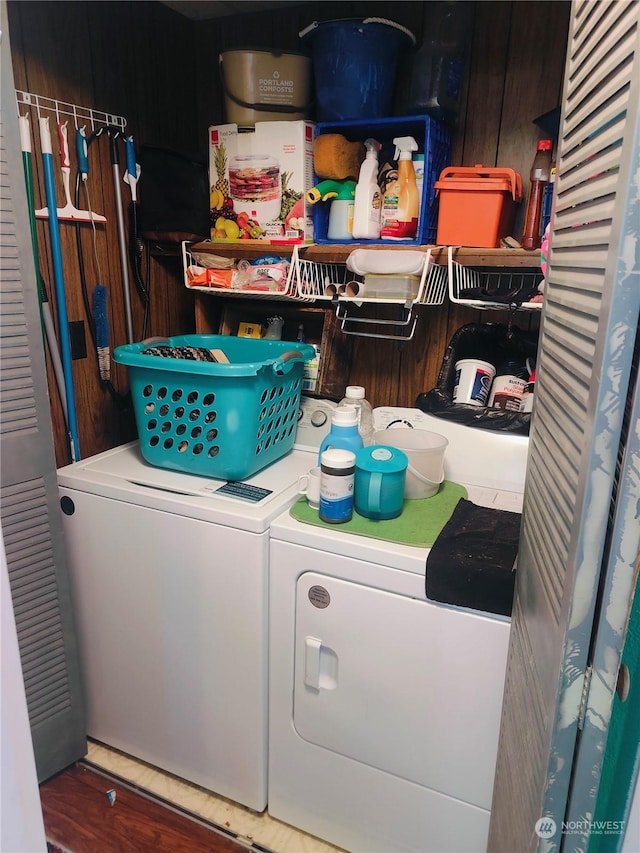 laundry room with separate washer and dryer