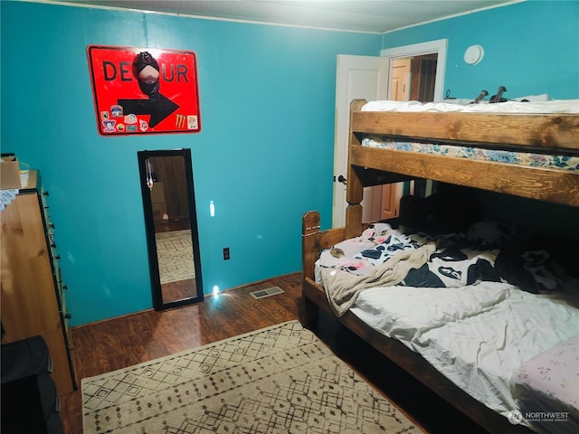 bedroom featuring hardwood / wood-style flooring