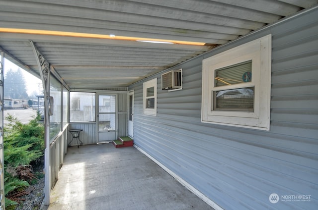 view of patio featuring a wall mounted air conditioner