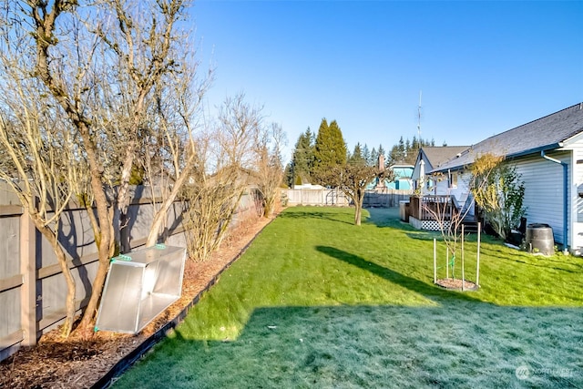 view of yard with a wooden deck