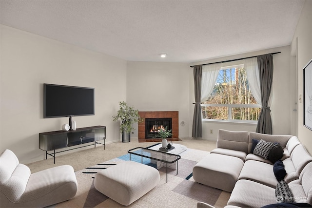 living room with light colored carpet and a fireplace