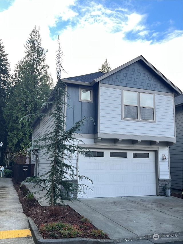 view of front of property with a garage