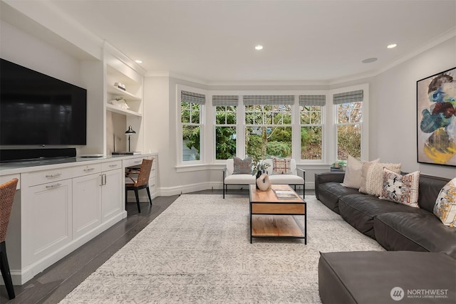 living room featuring dark wood-style floors, baseboards, crown molding, and recessed lighting