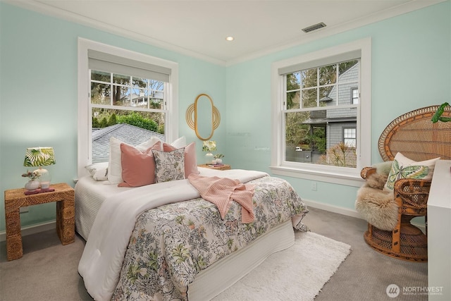 carpeted bedroom with ornamental molding, recessed lighting, visible vents, and baseboards