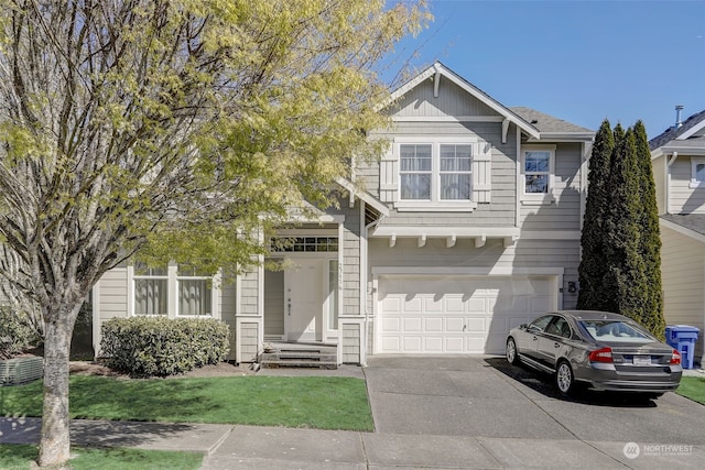 view of front of property with a garage