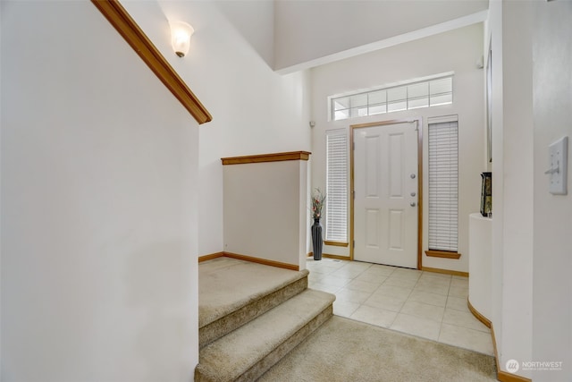 foyer with light tile patterned flooring