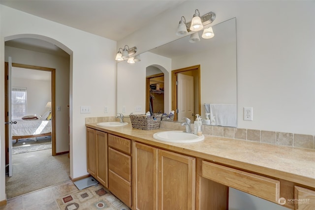 bathroom featuring vanity and tile patterned flooring