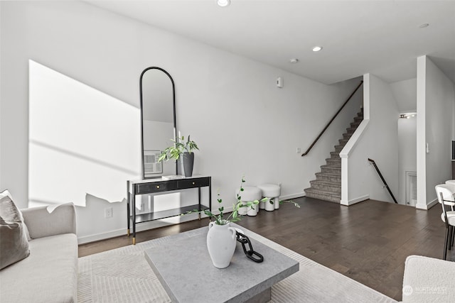 living room featuring dark hardwood / wood-style floors