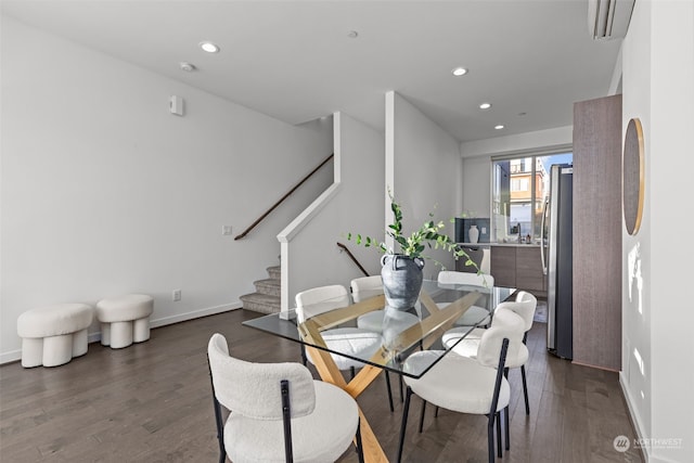 dining room with dark wood-type flooring