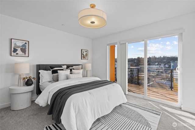 bedroom featuring carpet and access to outside