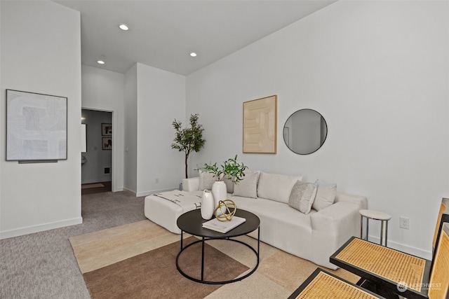 living room with light colored carpet