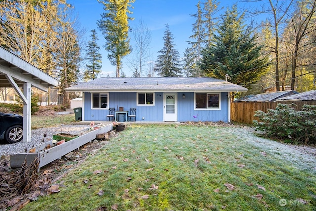 view of front facade with a front yard