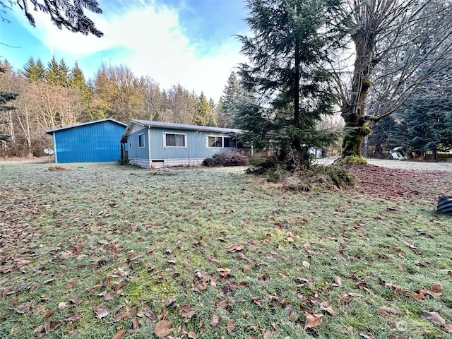 view of front of home featuring a front yard