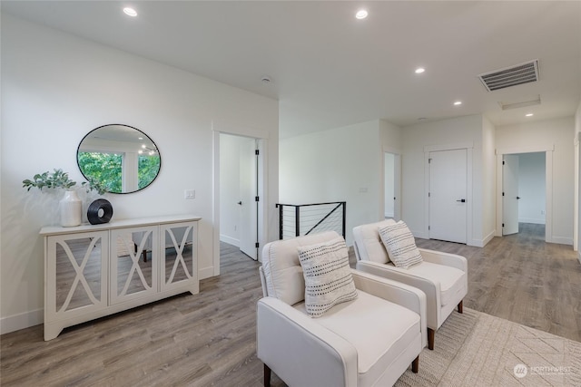 living area featuring light hardwood / wood-style floors