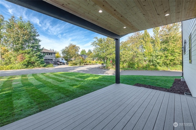 wooden deck with a yard