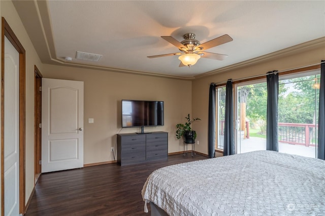 bedroom with ceiling fan, access to exterior, dark wood-type flooring, and crown molding