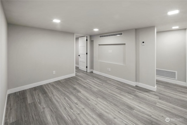 unfurnished room featuring light wood-type flooring