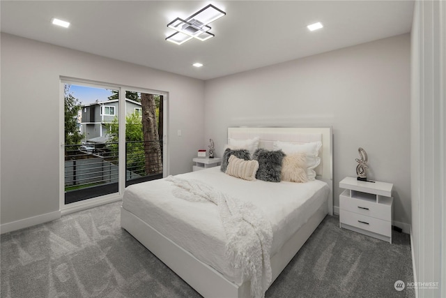 carpeted bedroom featuring access to outside