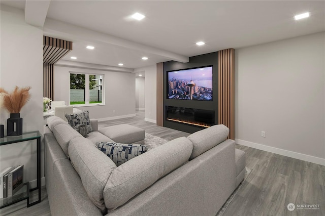 home theater featuring hardwood / wood-style floors