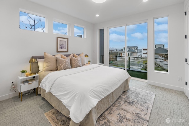 bedroom with light colored carpet