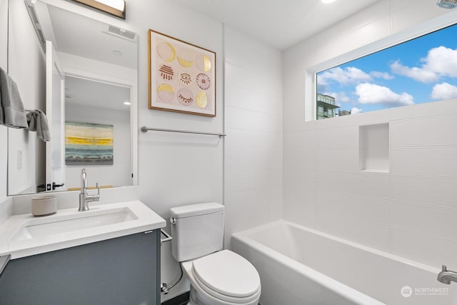 full bathroom featuring shower / bathtub combination, toilet, and vanity