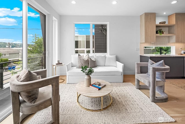 2011A Dexter Ave N, Seattle, WA 98109 - living room featuring recessed lighting, healthy amount of natural light, and light wood-type flooring