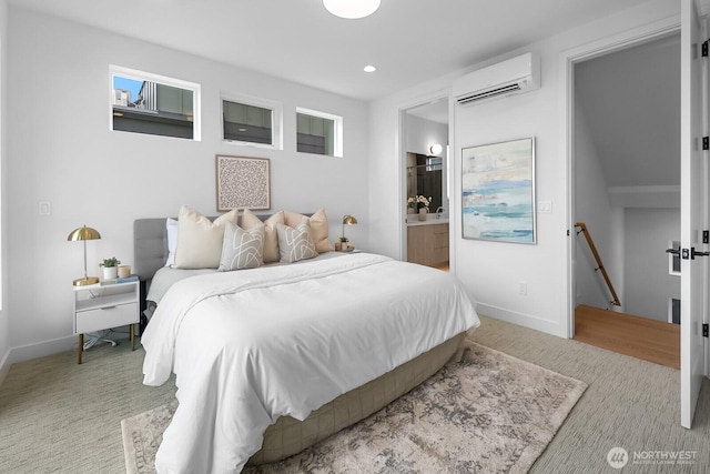 2011A Dexter Ave N, Seattle, WA 98109 - bedroom featuring a wall mounted AC, light colored carpet, connected bathroom, and recessed lighting
