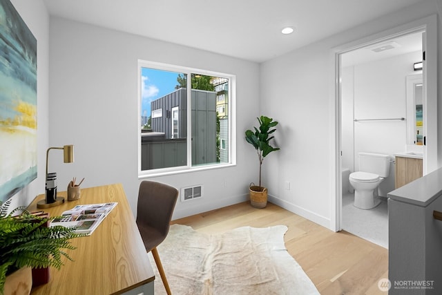 2011A Dexter Ave N, Seattle, WA 98109 - office area featuring wood finished floors and recessed lighting