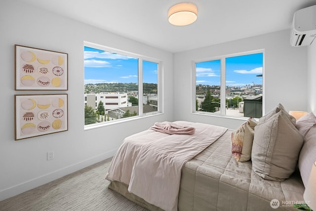 2011A Dexter Ave N, Seattle, WA 98109 - bedroom with a wall mounted air conditioner and baseboards