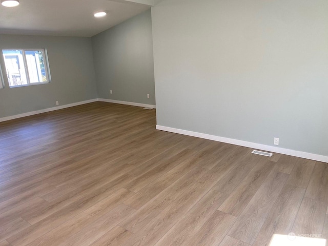 empty room featuring light hardwood / wood-style floors