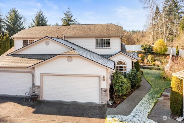 front facade with a garage