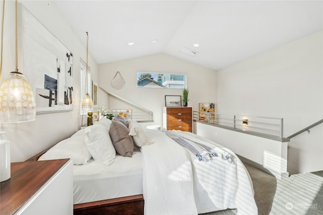 bedroom with lofted ceiling