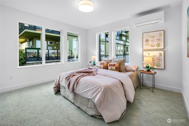 bedroom featuring an AC wall unit and carpet flooring