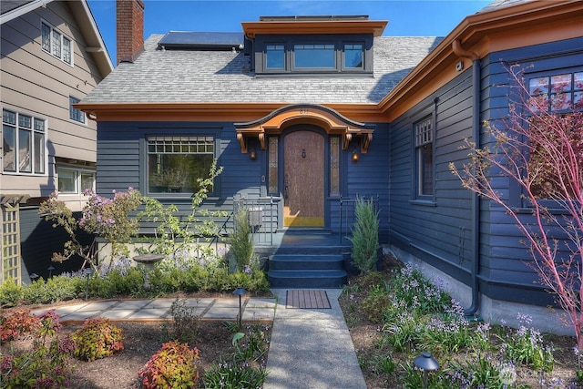 811 N I St, Tacoma, WA 98403 - view of front of house with solar panels and roof with shingles