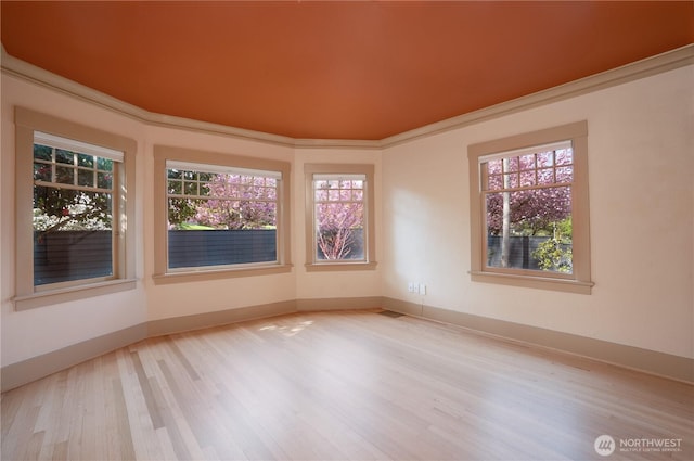 811 N I St, Tacoma, WA 98403 - empty room featuring visible vents, baseboards, and wood finished floors