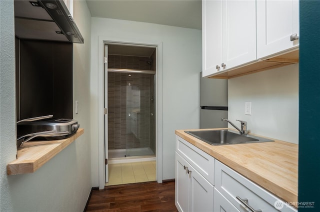 811 N I St, Tacoma, WA 98403 - full bath with a shower stall, vanity, and wood finished floors