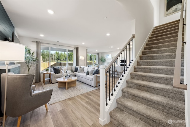 living room with light hardwood / wood-style flooring