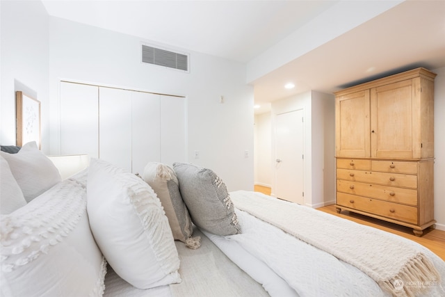 bedroom with light hardwood / wood-style flooring