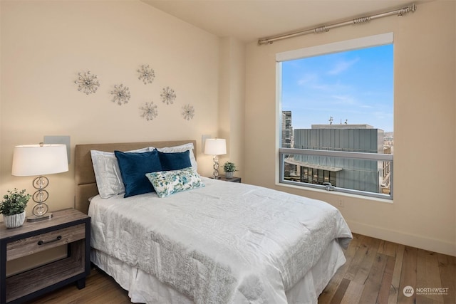 bedroom featuring hardwood / wood-style floors