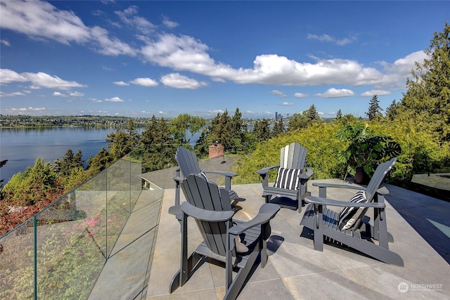 view of patio / terrace featuring a water view