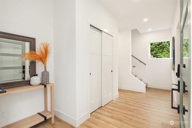 corridor featuring light hardwood / wood-style flooring