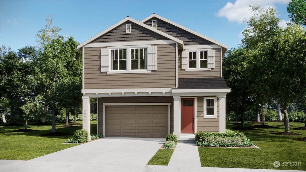 view of front of house with a garage and a front yard